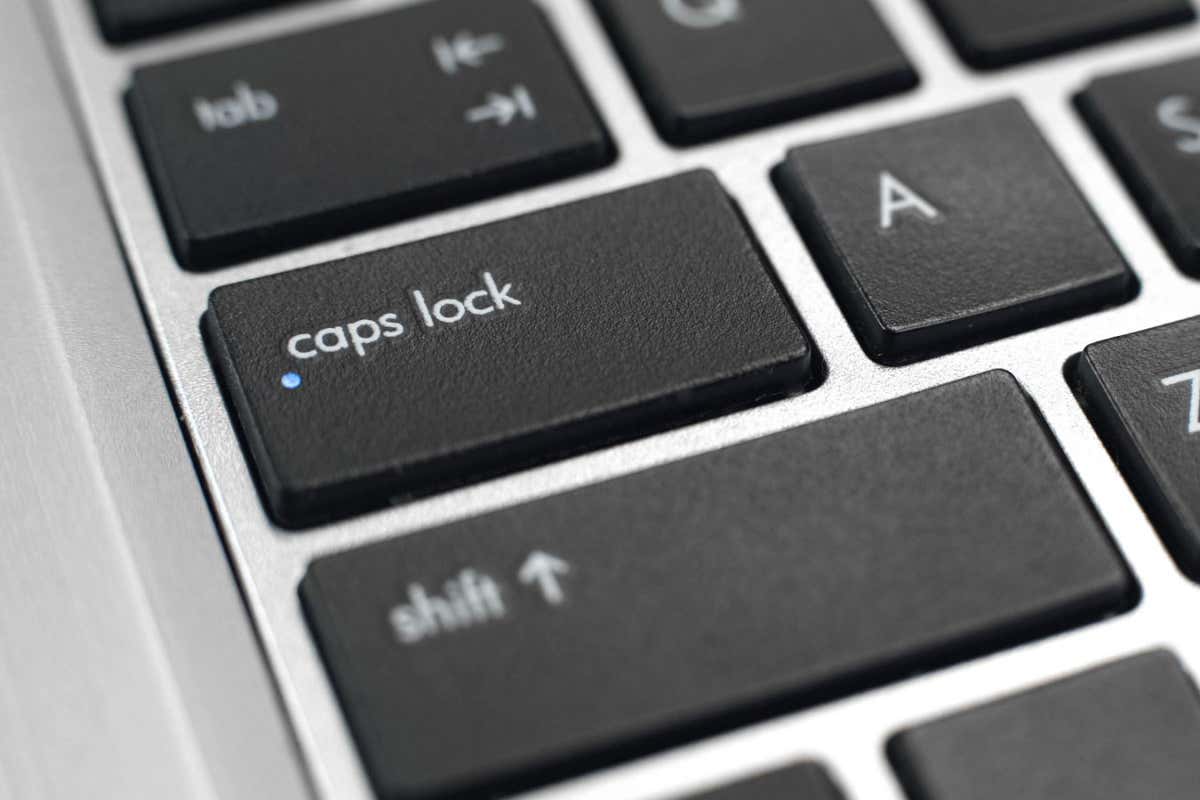 2AN93AM Caps lock button activated on keyboard, capital letter typing, switch key