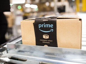 A package sits on a conveyor belt at an Amazon.com Inc. fulfillment center in the UK Amazon's shares have fallen over the past four years during its Prime Day event.